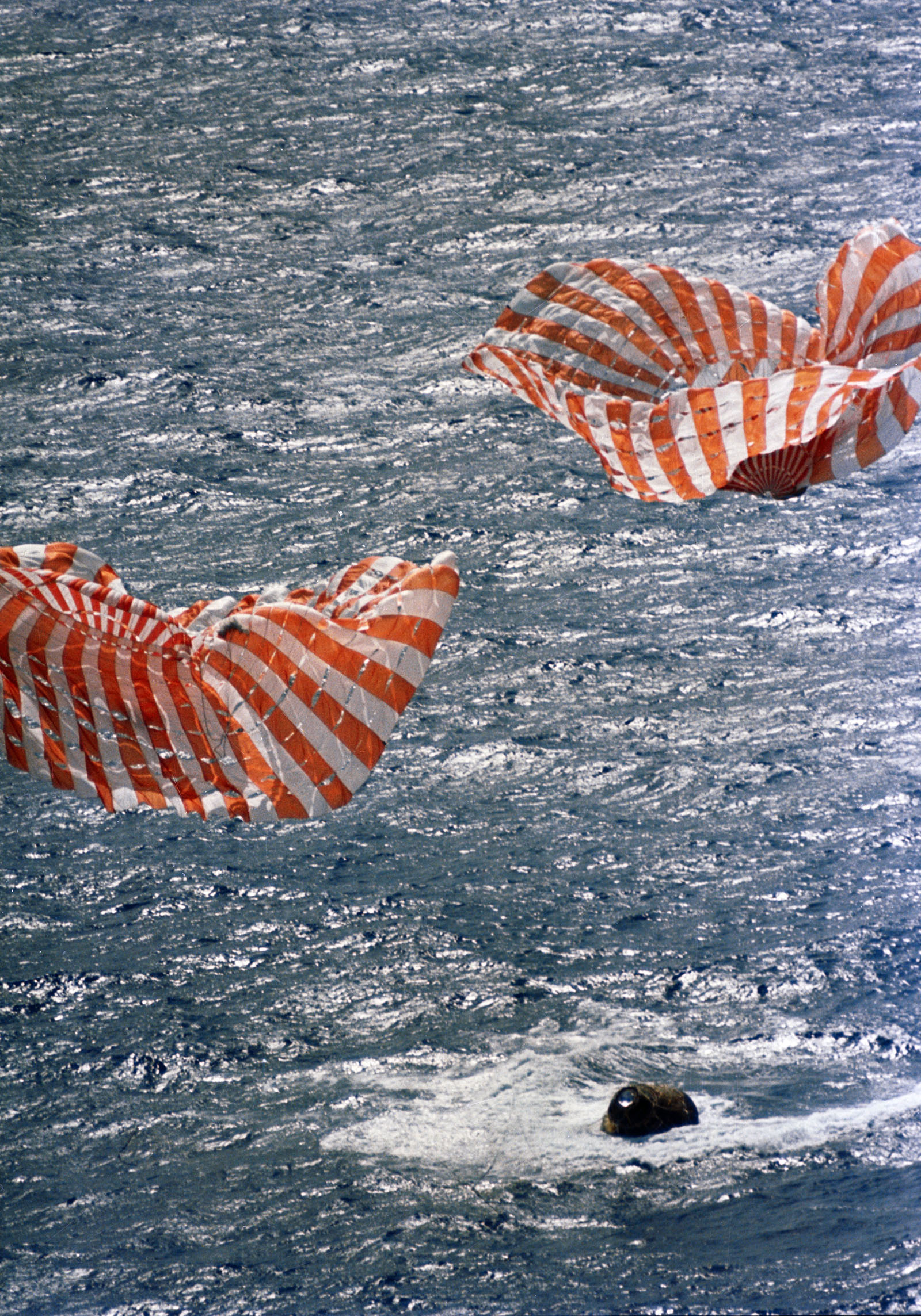 A photo of Apollo 14 command module splahes down into the South Pacific ocean