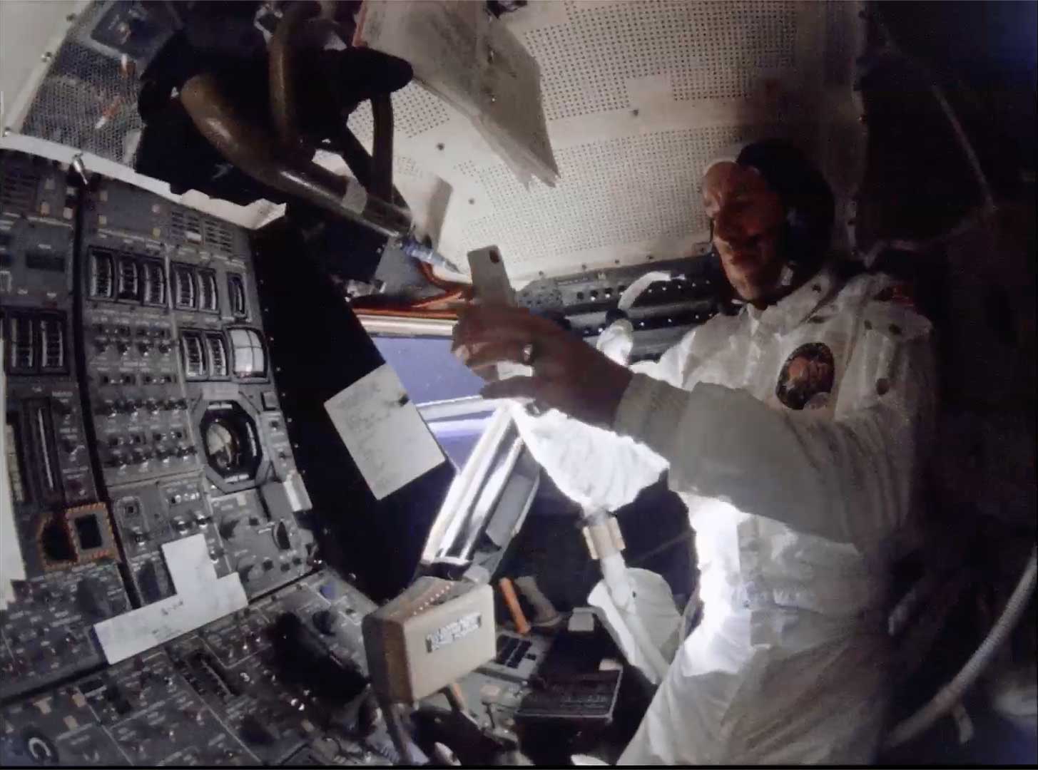 A photo of an astronaut in the cabin