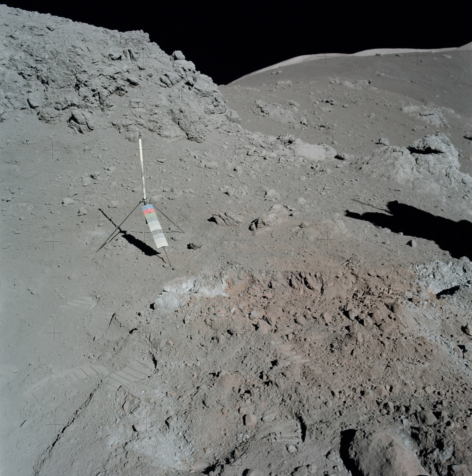 A photo of core tube into the deposit and sampled surrounding rocks