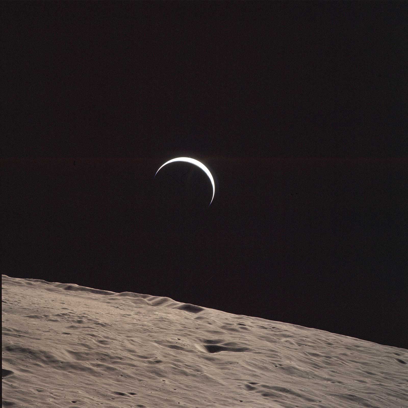 A photo of the Earth as a thin crescent