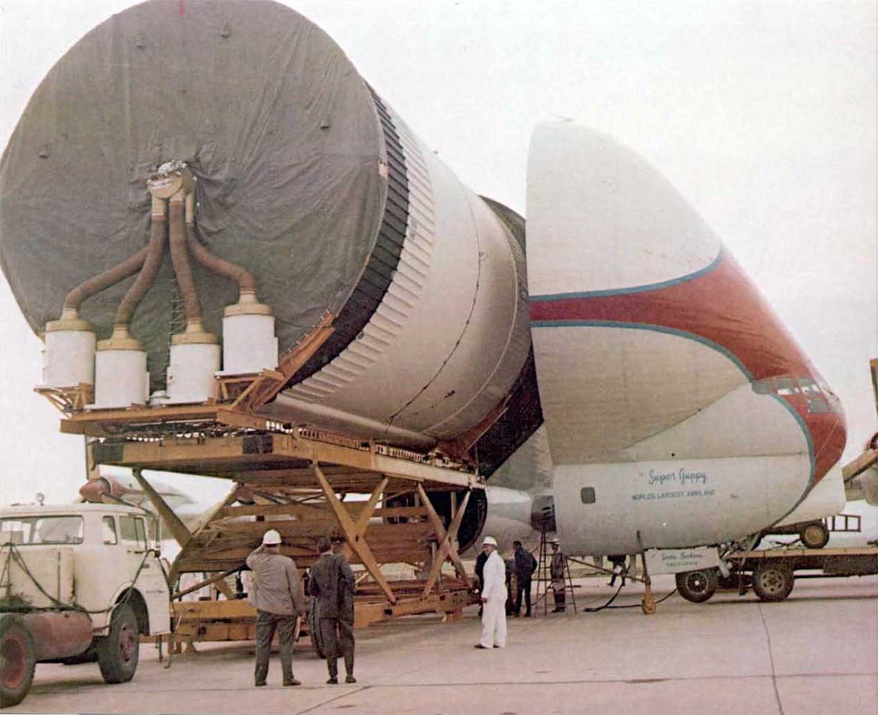 A photo of a S-IVB stage being unloaded onto a cargo trailer