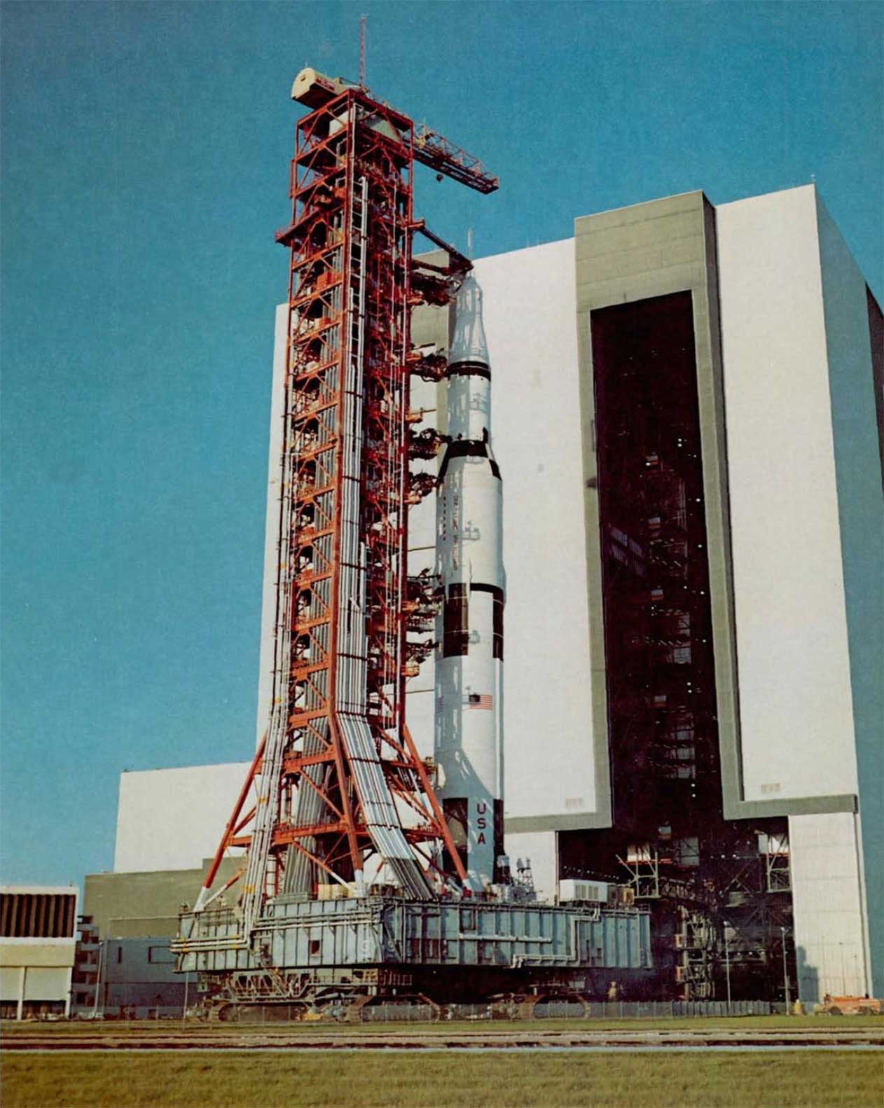 A photo of Apollo-Saturn rolling slowly out of the VAB