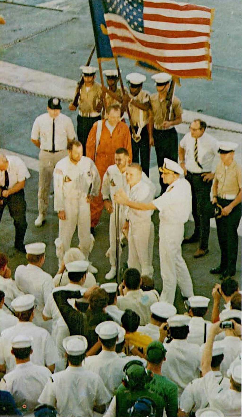 A photo of astronauts,Borman,Lovell, and Anders on USS Yorktown