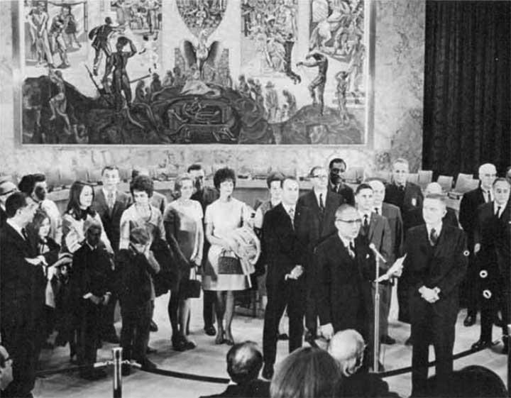 A photo of Secretary General U Thant,astronauts and their family in the Security Council chambers