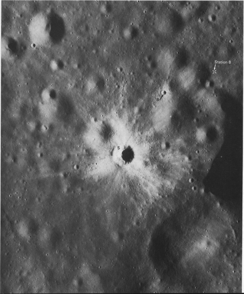 FIGURE 105. - The two bright-rayed craters in this picture have been examined more closely from the lunar surface than those illustrated earlier in this chapter. 