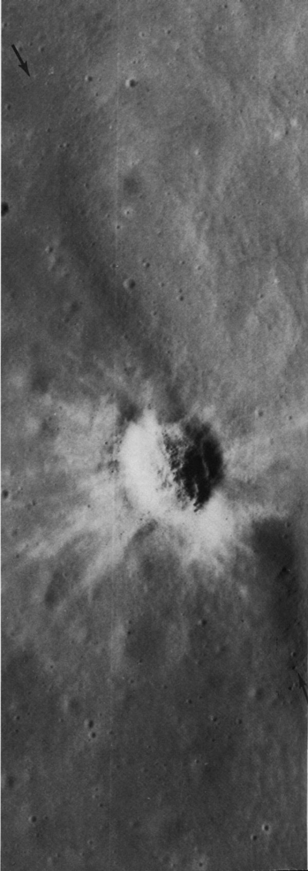 FIGURE 109. - The configuration of this small crater has been affected by the topography of the impact site.