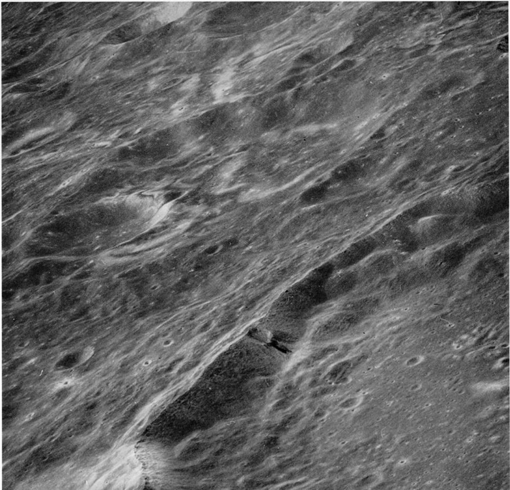 FIGURE 110. - An oblique view looking northwest at part of the wall of the crater Lobachevsky on the lunar far side. 