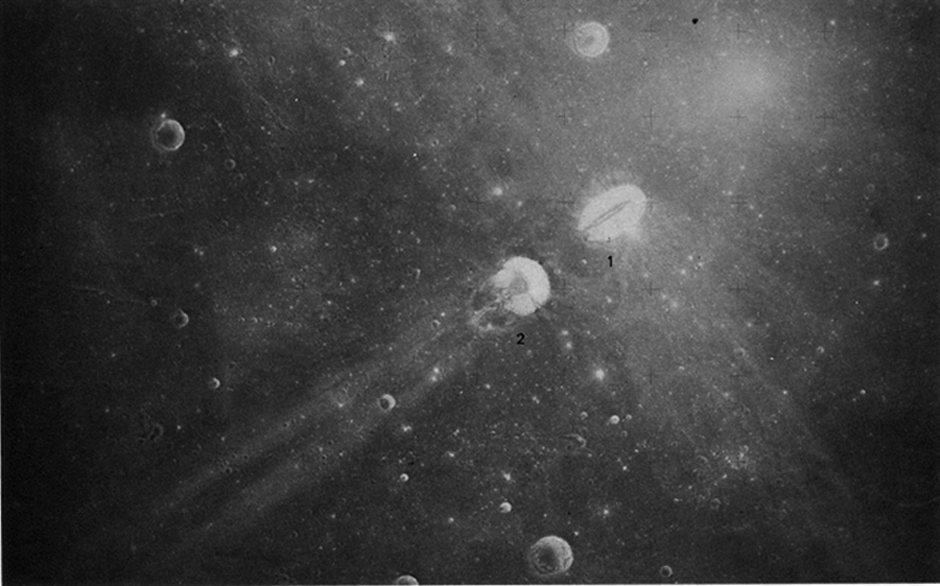 FIGURE 115 [above & below]. - Messier (1) and Messier A (2) are a pair of unusual craters in northwestern Mare Fecunditatis.