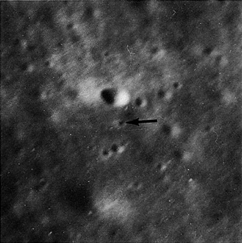 FIGURE 123. - An enlargement of approximately 40X showing another manmade crater.