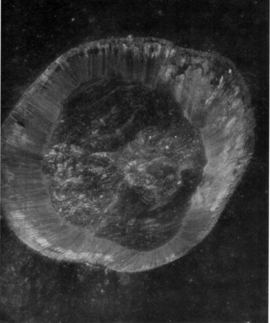 FIGURE 144. - This is a near vertical view of the crater Dawes, 18 km in diameter. Morphologically it is typical of many lunar craters in the 15- to 20-km size range.