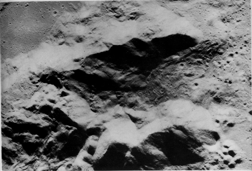 FIGURE 151. - The northern part of the central peak complex of the crater King is shown in this enlarged view. 