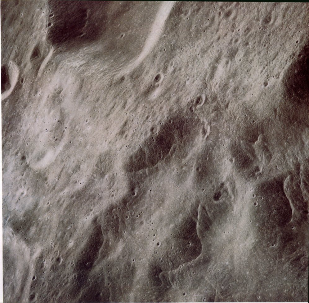 FIGURE 161. - The lobate scarps in the foreground are a lunar feature seen as Apollo 16 flew over the margins of King's ejecta blanket.