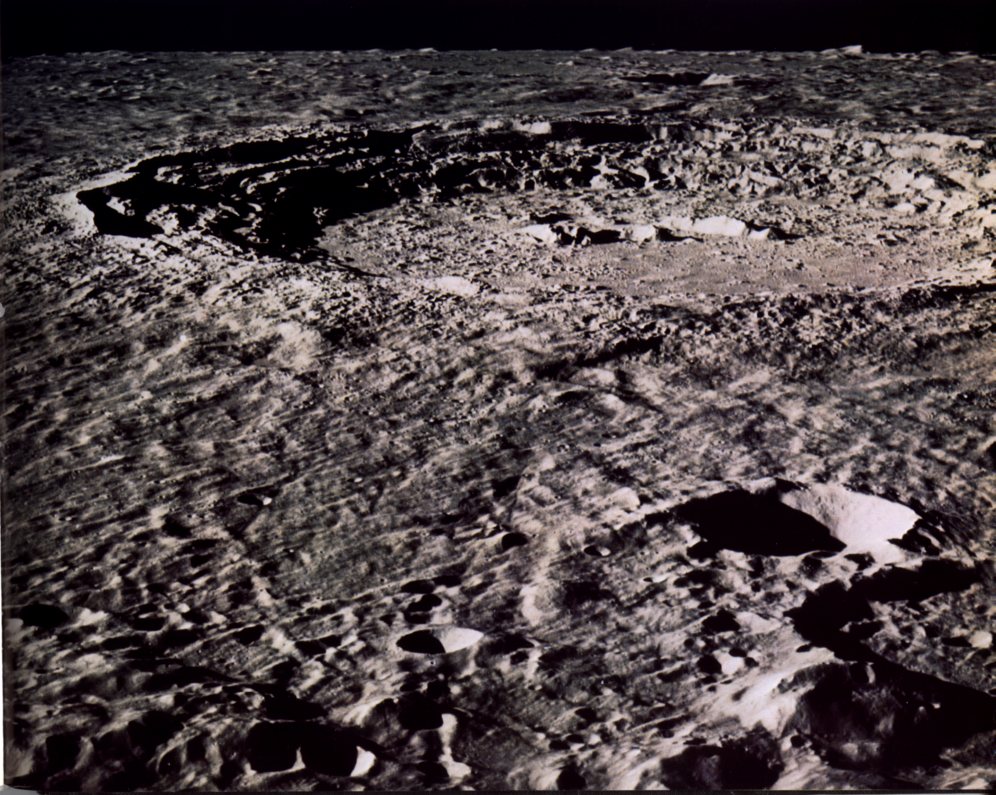 FIGURE 164. - The large crater Copernicus has served as a type example of lunar impact craters since the classic analysis was made by E. M. Shoemaker (1962).