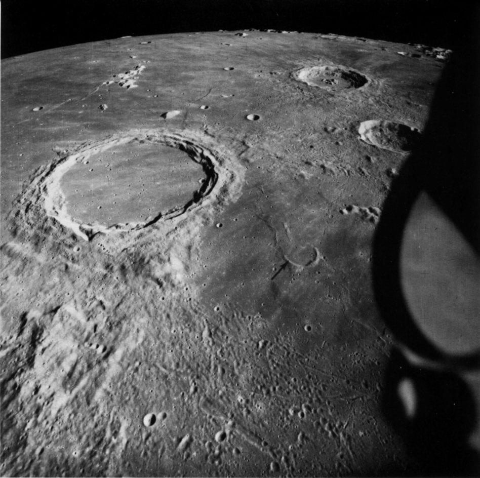 FIGURE 179. - The ejecta blanket and secondary impact craters of the mare-filled crater Archimedes (80 km in diameter) are visible on the terrain toward the viewer (south) but not on the mare surface to the crater's left and right. 