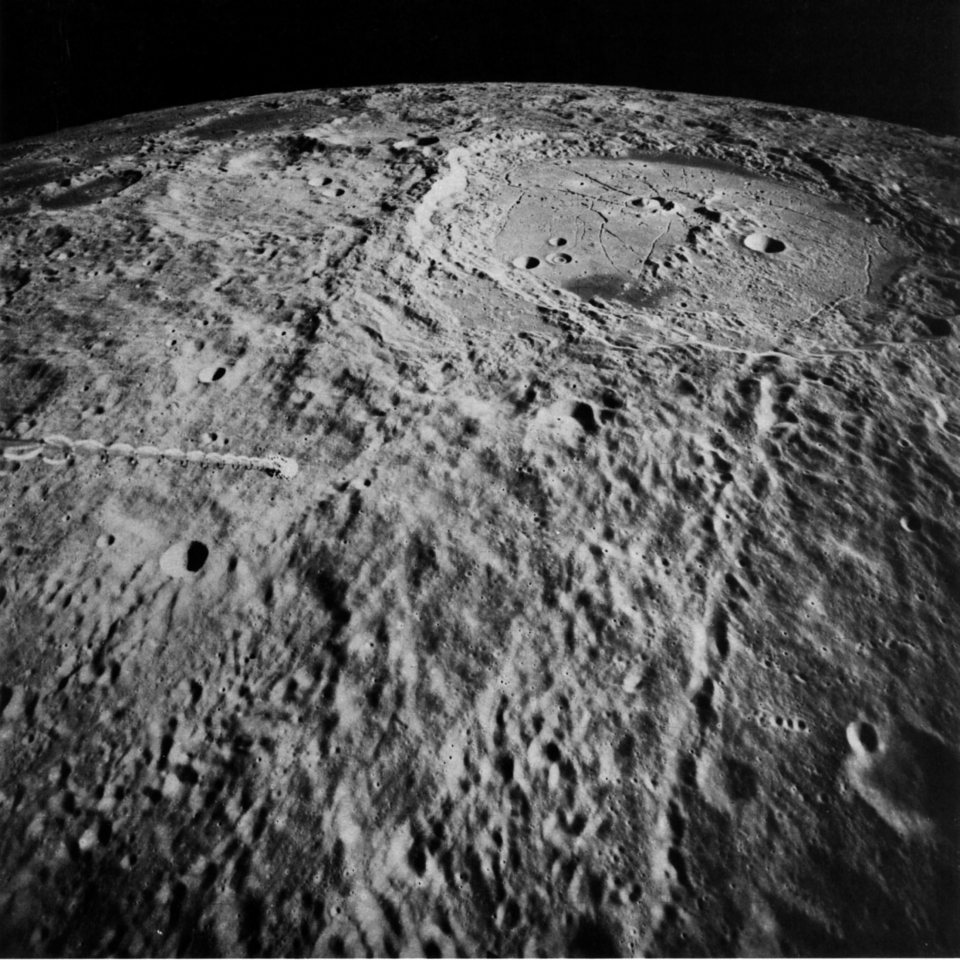 FIGURE 180. - The crater Humboldt, on the east limb of the Moon, as seen from Earth, is 200 km across, a little larger than Tsiolkovsky. 