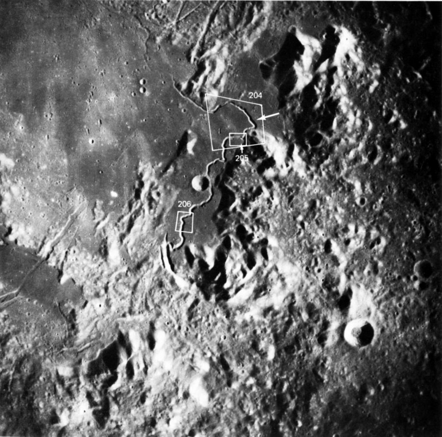 FIGURE 202. - This Apollo IS photograph depicts the sinuous Hadley Rille, the Apennine Mountains trending from lower left to upper right, and the smooth surface of Palus Putredinus (Marsh of Decay) in the upper left quarter.