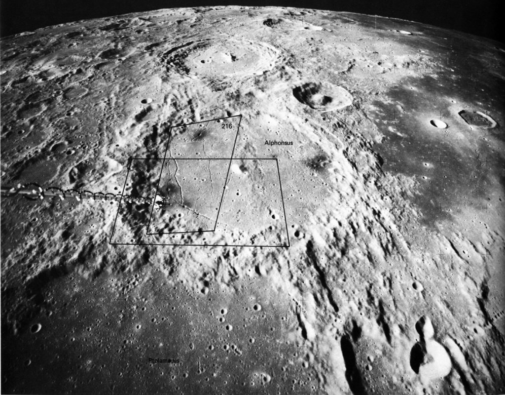 FIGURE 211. - This oblique metric photo shows part of the lunar highlands where the ancient crust is saturated with large craters.