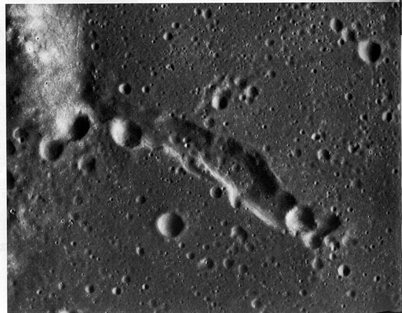 FIGURE 226. - Low-rimmed or rimless depressions having irregular outlines are not uncommon on mare surfaces.