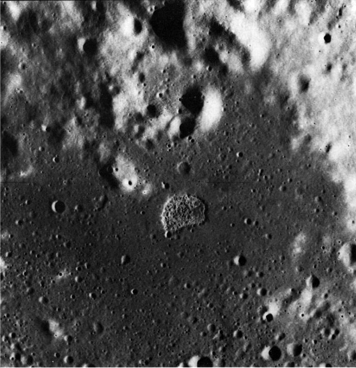 FIGURE 232. - The steep-walled but shallow D-shaped depression near the center of the photograph is apparently a unique feature.