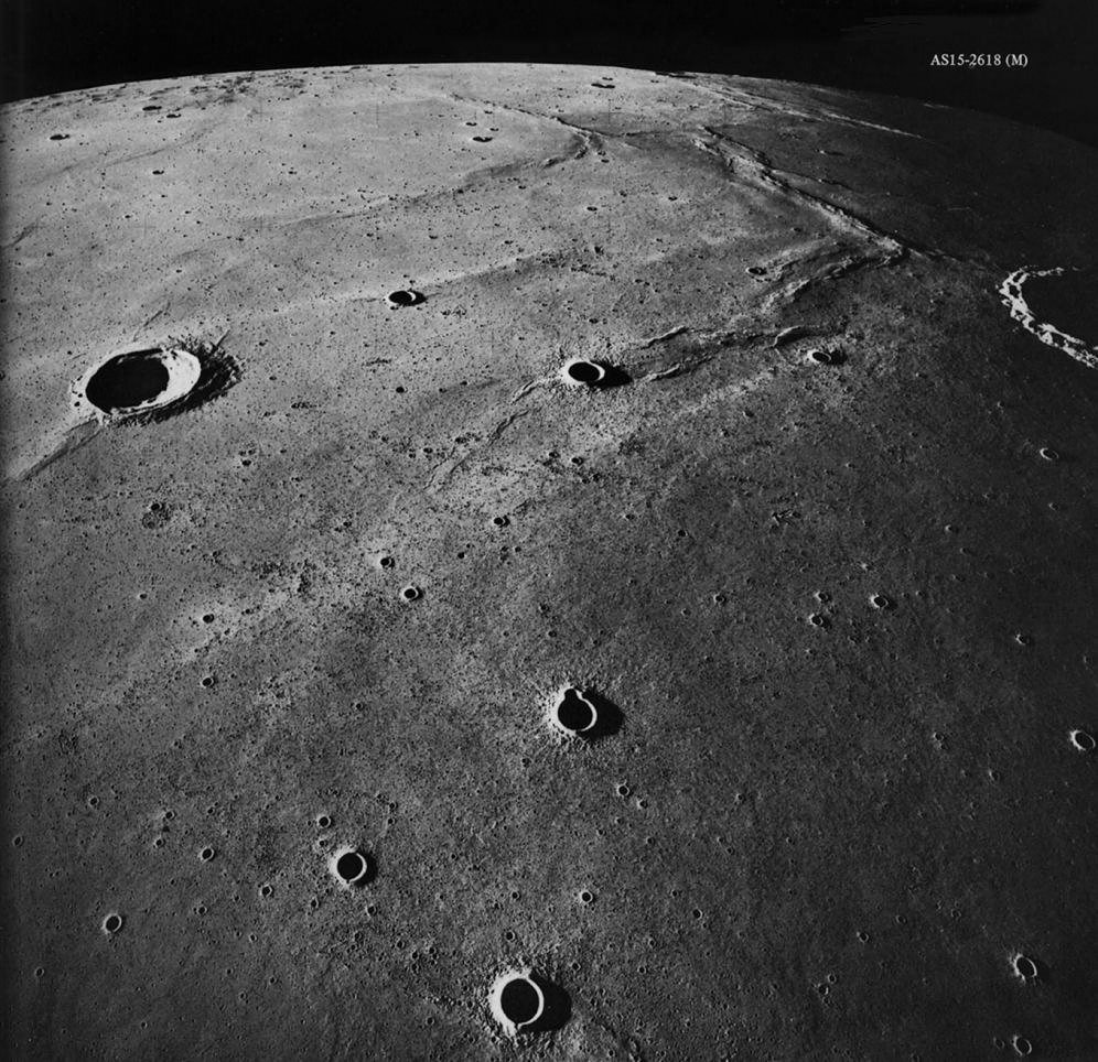 Figure 31. -  During the various Apollo missions, the west limb of the Moon was in shadow behind the terminator and could not be photographed.  AS15-2618 (M)