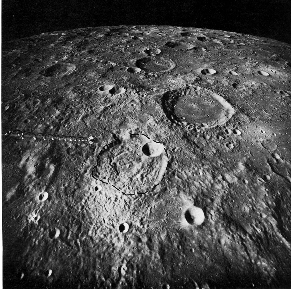 FIGURE 45. - These terrae of the central highlands are near the Apollo 16 landing site. The landing point is indicated by the arrow just below the lower (northern) edge of the picture.