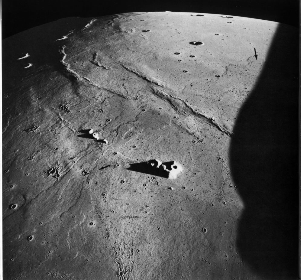 FIGURE 66. - Two of the younger lava flows described in figure 65 are here followed northeastward to their terminations (see arrows) near the center of Mare Imbrium. 