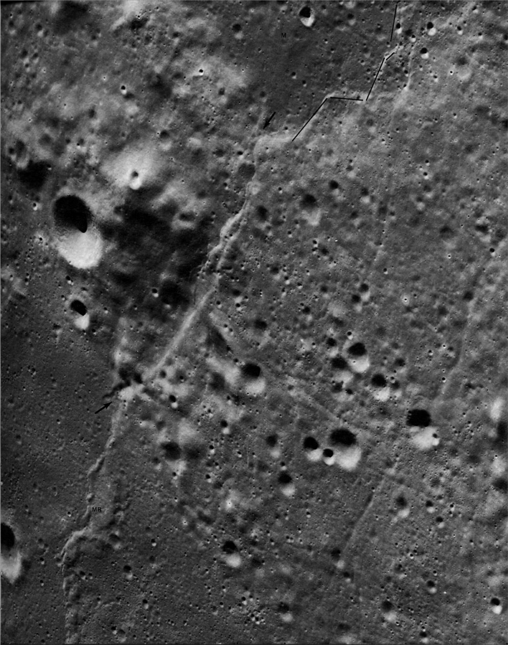 FIGURE 86. - In this picture we see another example of the close relationship between mare ridges and faults.